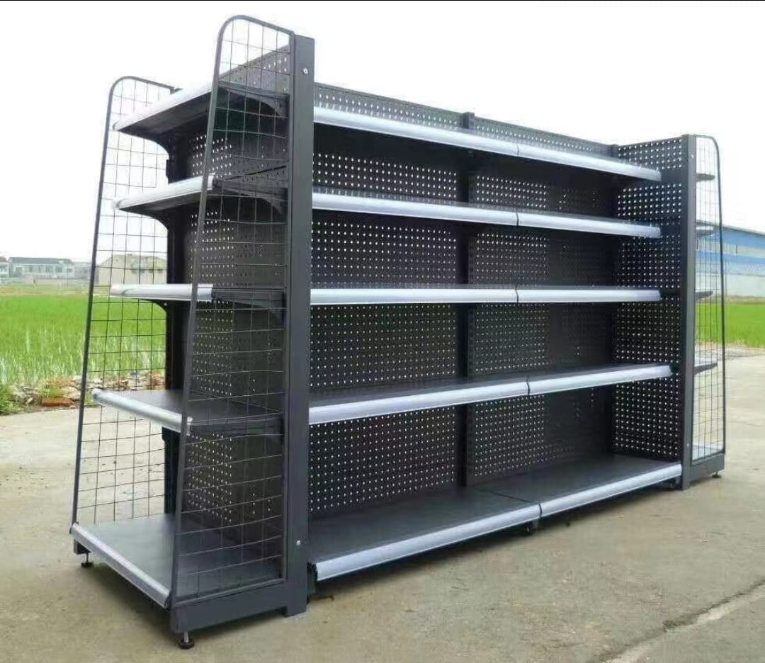Double-sided gondola shelving units with end bays on both sides and 4 Mesh panels
